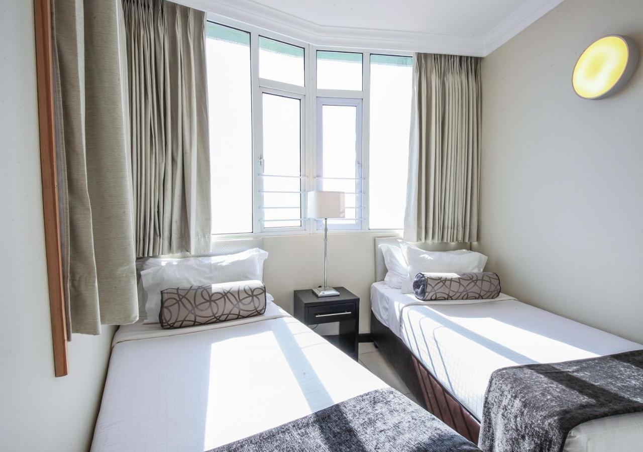 Blue Waters Hotel Durban Exterior photo Two single beds in a hotel room